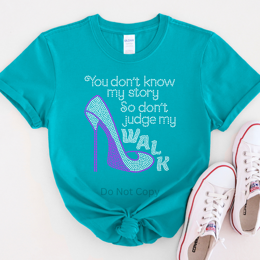 You Don't Know My Story Rhinestone Transfer on a blue short sleeve tshirt