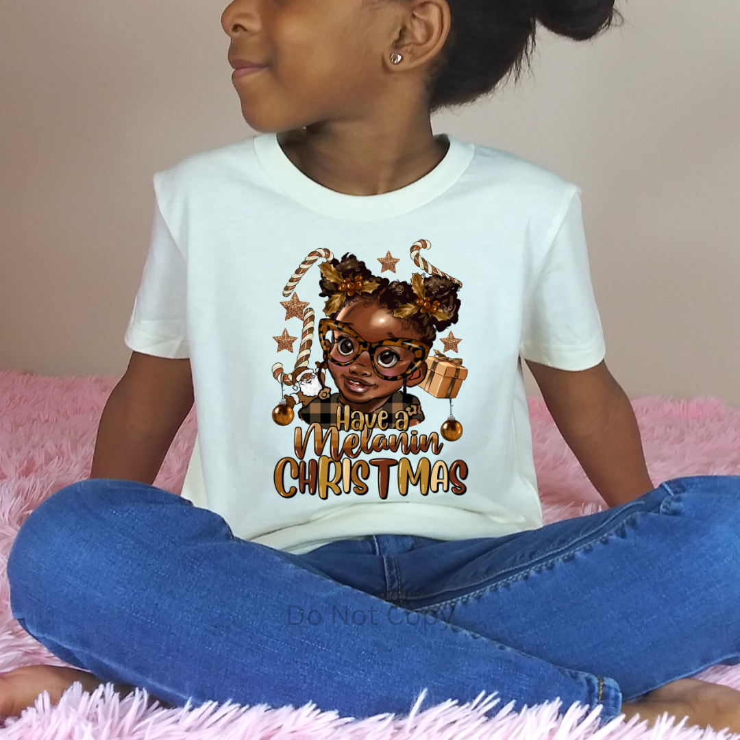 Have a Melanin Christmas Girl DTF Transfer on a tshirt