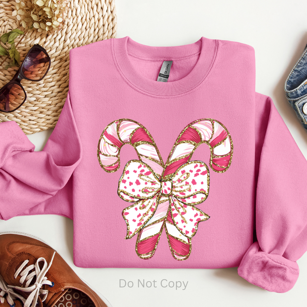 Glitter Candy Cane DTF Transfer on a tshirt