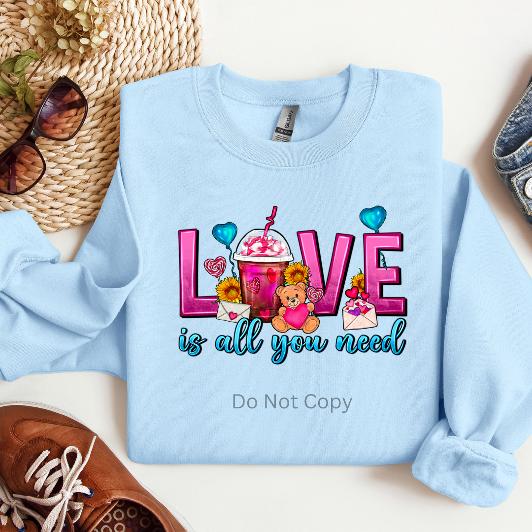 Love Is All You Need DTF Transfer on a tshirt front side