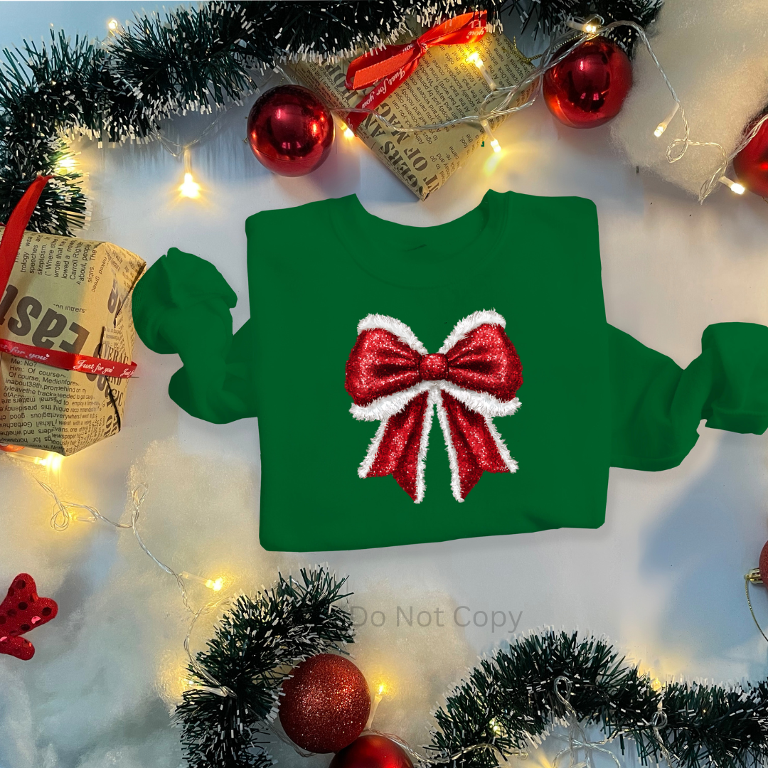 Santa Bow DTF Transfer on a tshirt