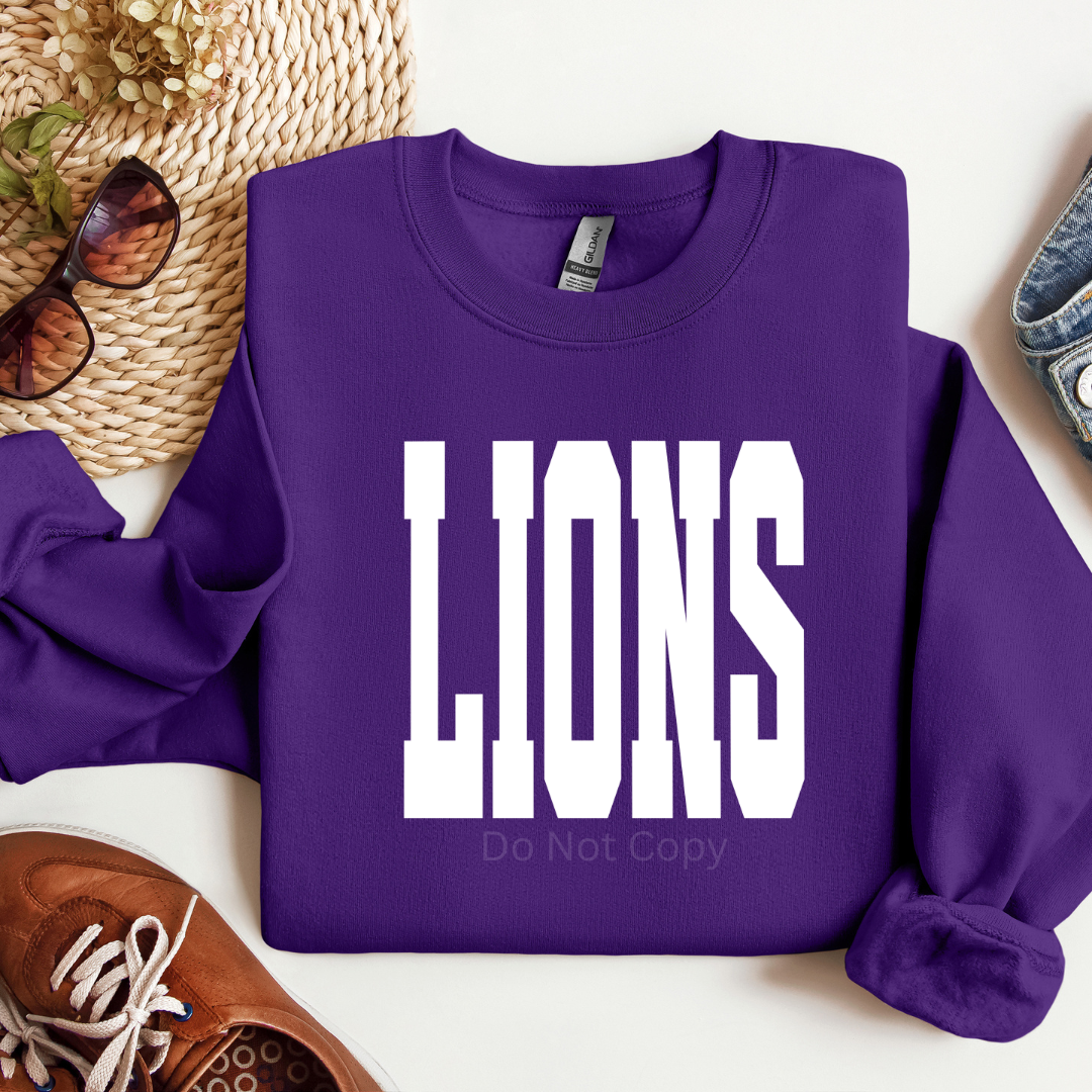 Lions text in white in block format on purple sweatshirt