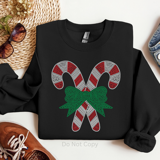Candy Cane Rhinestone Transfer on a black tshirt.