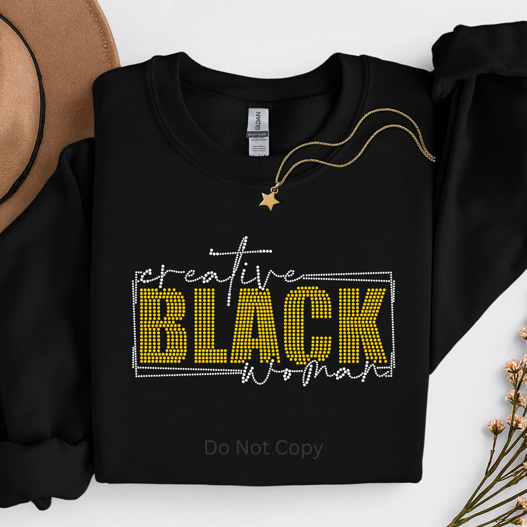 Black sweatshirt with 'creative BLACK woman' text on a white background