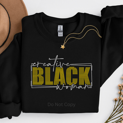 Black sweatshirt with 'creative BLACK woman' text on a white background