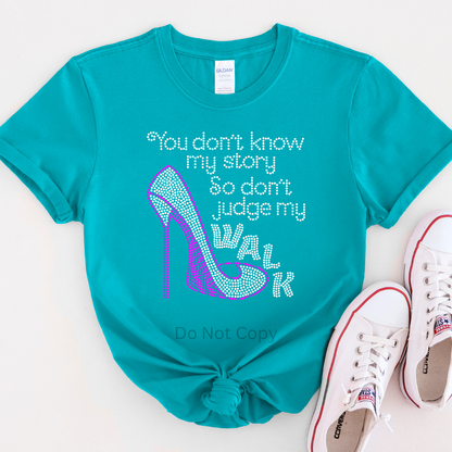 You Don't Know My Story Rhinestone Transfer on a blue short sleeve tshirt