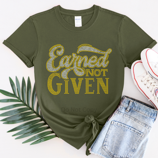 Earned Not Given rhinestone transfer on green T‑shirt – heat press design