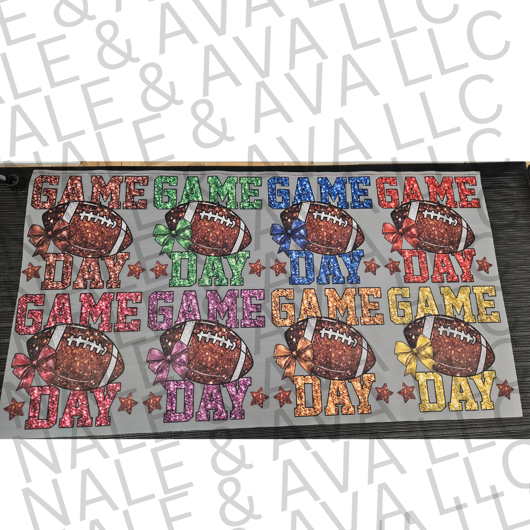Decorative mat with 'Game Day' text and football graphics on a gray background.