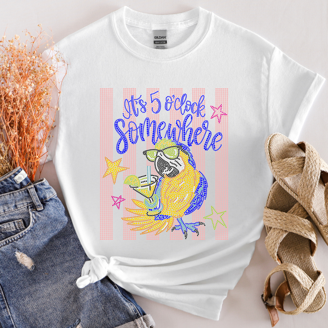 White sweatshirt with colorful graphic and text 'It's 5 o'clock somewhere' on a light background.
