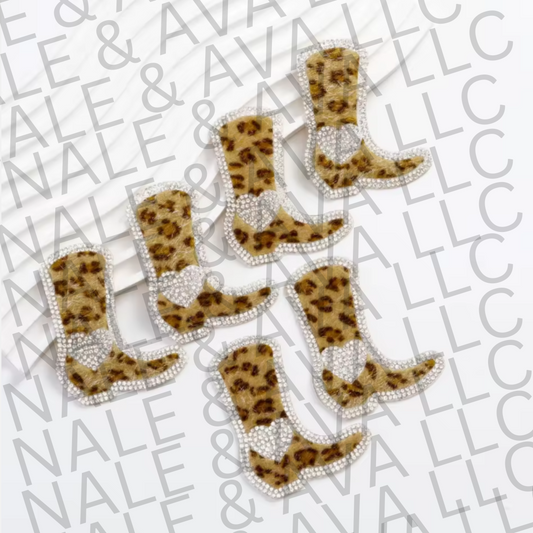 Leopard print cowboy boot-shaped patches on a white background with 'Nale & Nale' text.