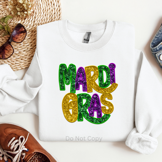 Mardi Gras Faux Sequin DTF Transfer on a tshirt front side