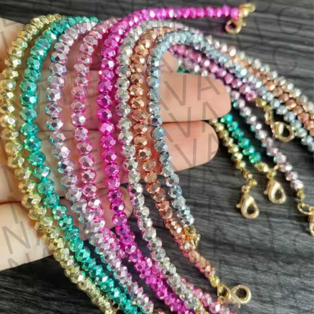 Colorful beaded necklaces on a dark surface
