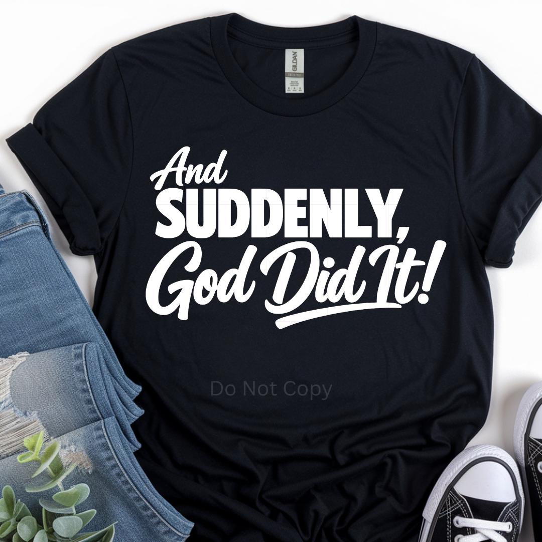Black t-shirt with white text 'And SUDDENLY, God Did It!' on a white background.