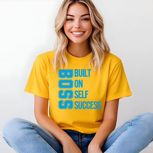 Built On Self Success Screen Print Heat Transfer on a gold tshirt