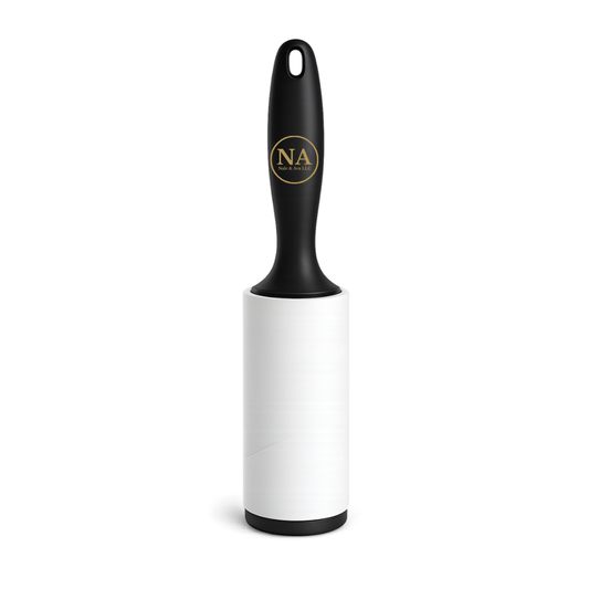 Lint roller with black handle and white body on a white background