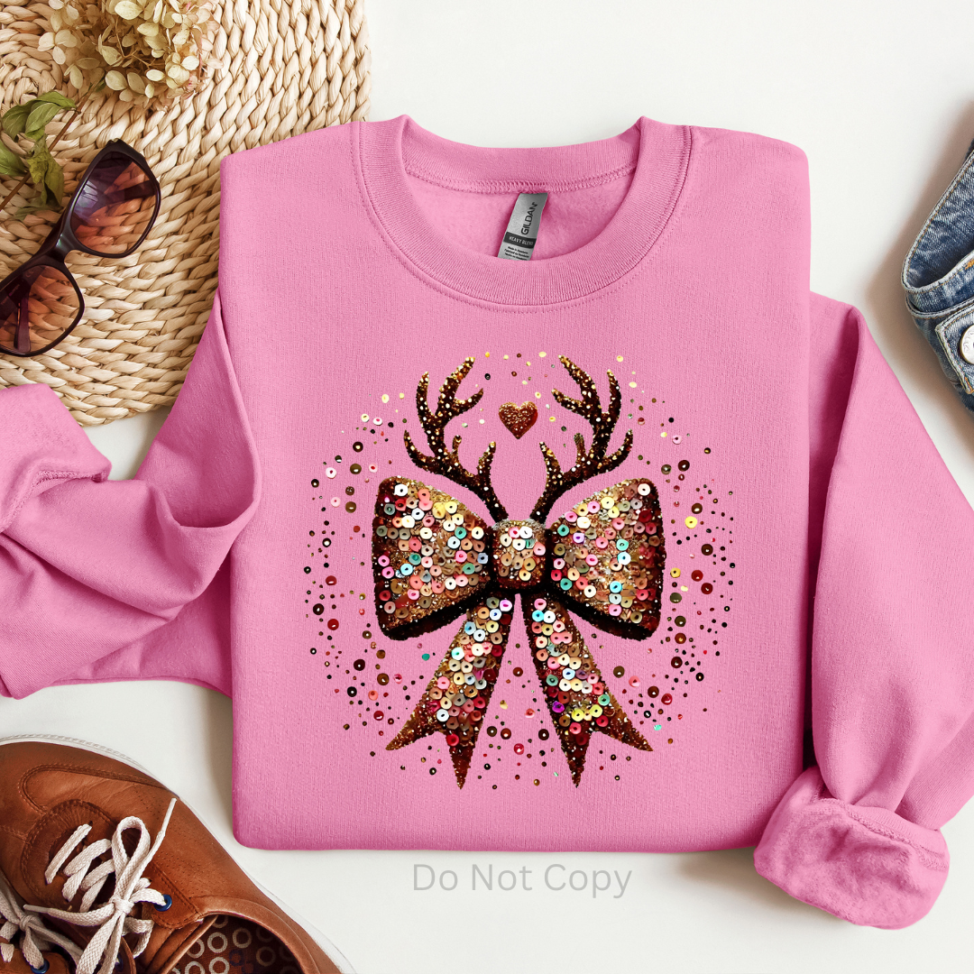 Reindeer Sequin Bow DTF Transfer on a tshirt
